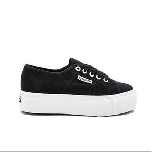 Used size 6.5 black platform Supergas